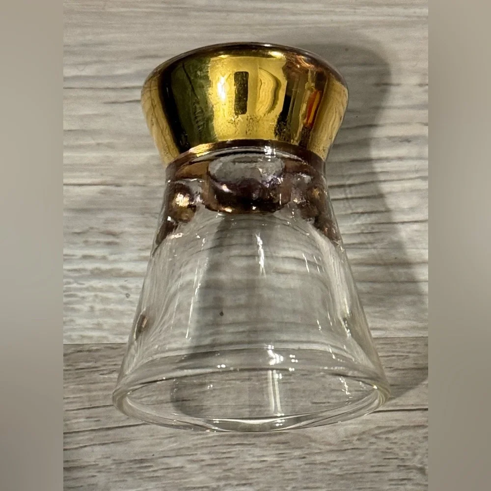 Vintage shot glass. The stem is plated with 22-karat gold.